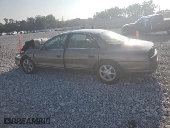 ✅ 1999 Oldsmobile Aurora • VIN: 1G3GR62CXX4119238 • Лот: 68432415. Опубликован ранее на Copart с пробегом 107 576 миль. Бесплатный доступ к архиву аукционных продаж из США и подробный отчёт об истории автомобиля на DreamBid. Изображение 2.