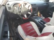 ✅ 2009 Dodge Challenger R/T • VIN: 2B3LJ54T79H581812 • Lot: 82593384. Wystawiony na Copart z przebiegiem 184 712 mil. Bezpłatny archiwum sprzedaży aukcyjnych z USA i szczegółowy raport historii pojazdu na DreamBid. Zdjęcie 8.