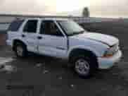 2002 Chevrolet Blazer LS z VIN 1GNDT13W12K169005, wystawiony jako Copart lot #84643884 z przebiegiem Nie podano mil oraz Szkoda całkowita • Salvage title. Historia ofert i sprzedaży dostępna na DreamBid. Obrazek 4.