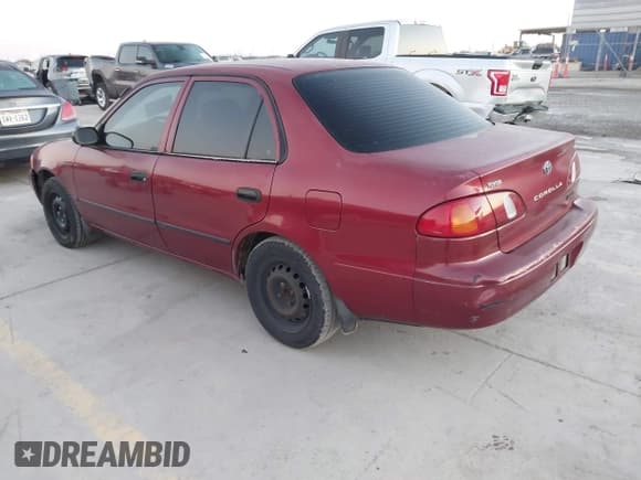 ✅ 2000 Toyota Corolla VE • VIN: 2T1BR12E9YC270164 • Lot: 43479741. Listed on IAAI with 138,128 mi. Free auction sales archive from the USA and detailed vehicle history report at DreamBid. Image 3.