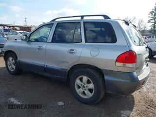 2005 Hyundai Santa Fe GLS z VIN KM8SC13D95U917986, wystawiony jako IAAI lot #41423901 z przebiegiem 163 885 mil mil oraz . Historia ofert i sprzedaży dostępna na DreamBid. Obrazek 3.