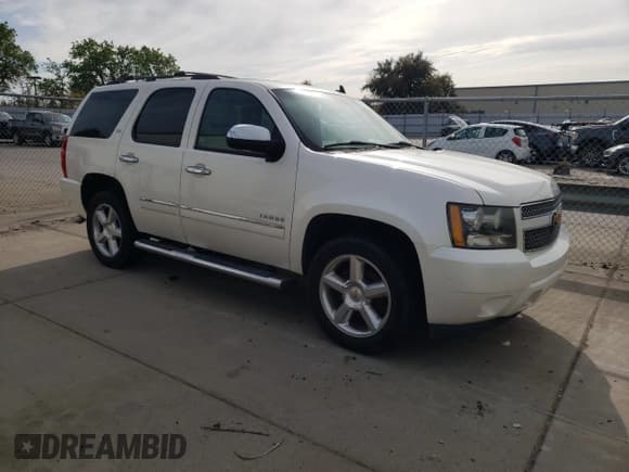 ✅ 2012 Chevrolet Tahoe LTZ • VIN: 1GNSCCE04CR213048 • Lot: 51284685. Listed on Copart with 192,733 mi. Free auction sales archive from the USA and detailed vehicle history report at DreamBid. Image 4.