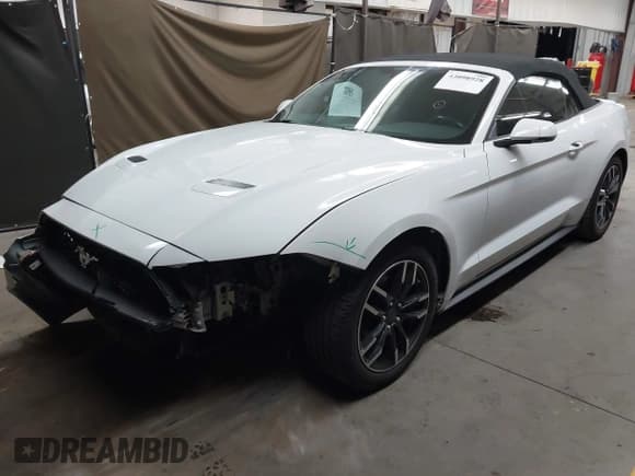 ✅ 2018 Ford Mustang EcoBoost Premium • VIN: 1FATP8UH1J5145274 • Lot: 43098928. Listed on IAAI with 85,857 mi. Free auction sales archive from the USA and detailed vehicle history report at DreamBid. Image 2.