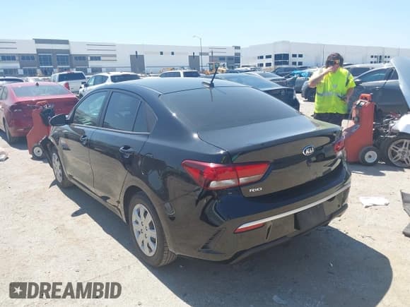 ✅ 2023 Kia Rio S • VIN: 3KPA24AD7PE564852 • Lot: 43141187. Listed on IAAI with 127,507 mi. Free auction sales archive from the USA and detailed vehicle history report at DreamBid. Image 3.