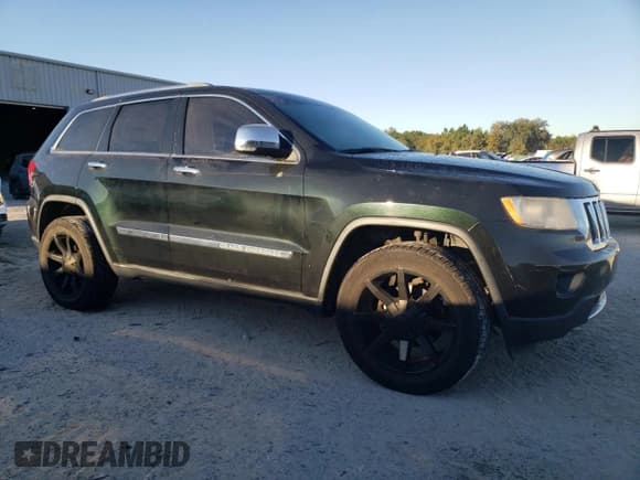 ✅ 2012 Jeep Grand Cherokee Limited • VIN: 1C4RJEBGXCC266320 • Lot: 90787215. Listed on Copart with 226,105 mi. Free auction sales archive from the USA and detailed vehicle history report at DreamBid. Image 4.