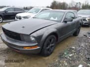 ✅ 2007 Ford Mustang Deluxe • VIN: 1ZVFT80N275370601 • Lot: 43842084. Listed on IAAI with 164,952 mi. Free auction sales archive from the USA and detailed vehicle history report at DreamBid. Image 2.
