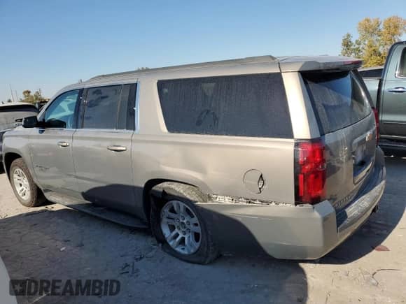 2018 Chevrolet Suburban LS z VIN 1GNSKGEC8JR390719, wystawiony jako Copart lot #77217534 z przebiegiem 83 356 mil mil oraz Szkoda całkowita • Salvage title. Historia ofert i sprzedaży dostępna na DreamBid. Obrazek 2.