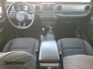 ✅ 2022 Jeep Gladiator Willys Sport • VIN: 1C6HJTAG2NL133000 • Лот: 58416125. Опубликован ранее на Copart с пробегом 65 590 миль. Бесплатный доступ к архиву аукционных продаж из США и подробный отчёт об истории автомобиля на DreamBid. Изображение 8.