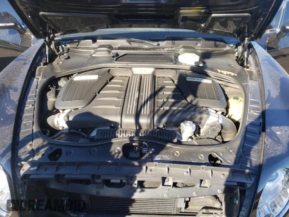 ✅ 2014 Bentley Continental GT • VIN: SCBGC3ZA5EC087275 • Лот: 79300774. Опубликован ранее на Copart с пробегом 38 137 миль. Бесплатный доступ к архиву аукционных продаж из США и подробный отчёт об истории автомобиля на DreamBid. Изображение 11.