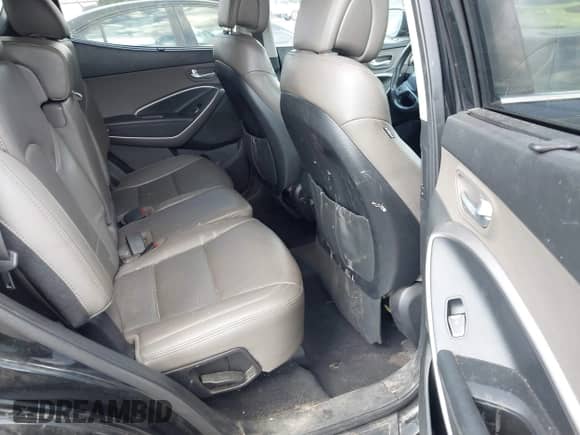 2016 Hyundai Santa Fe z VIN 5XYZUDLB8GG311292, wystawiony jako IAAI lot #43247809 z przebiegiem 169 191 mil mil oraz . Historia ofert i sprzedaży dostępna na DreamBid. Obrazek 8.