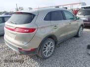 ✅ 2015 Lincoln MKC • VIN: 5LMCJ1A97FUJ46550 • Lot: 43717504. Listed on IAAI with 151,722 mi. Free auction sales archive from the USA and detailed vehicle history report at DreamBid. Image 4.