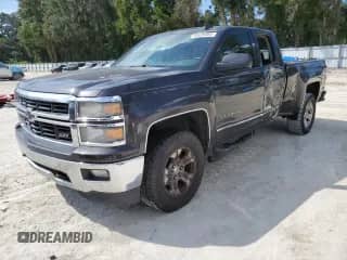 2015 Chevrolet Silverado 1500 LT with VIN 1GCRCREC3FZ308452, listed as a Copart auction lot 80629885 with 256,319 mi miles and Salvage title. Bid and sale history available at DreamBid. Image 1.