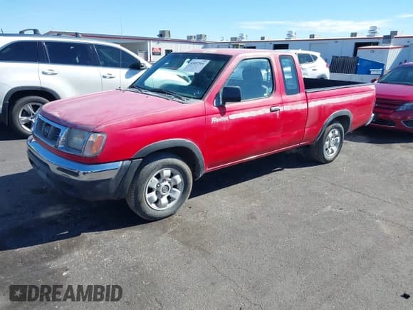 ✅ 1998 Nissan Frontier XE • VIN: 1N6DD26S6WC378984 • Lot: 43497551. Listed on IAAI with 309,503 mi. Free auction sales archive from the USA and detailed vehicle history report at DreamBid. Image 2.
