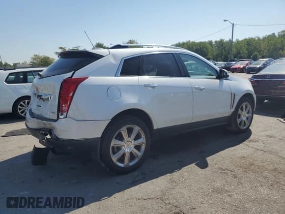 ✅ 2016 Cadillac SRX Premium Collection • VIN: 3GYFNDE3XGS517423 • Lot: 70914805. Listed on Copart with 164,008 mi. Free auction sales archive from the USA and detailed vehicle history report at DreamBid. Image 3.