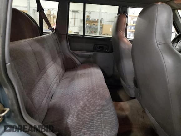 ✅ 1998 Jeep Cherokee Sport • VIN: 1J4FJ68S9WL122356 • Лот: 90879665. Опубликован ранее на Copart с пробегом 264 909 миль. Бесплатный доступ к архиву аукционных продаж из США и подробный отчёт об истории автомобиля на DreamBid. Изображение 11.