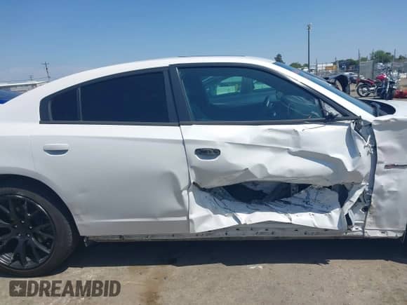 ✅ 2014 Dodge Charger RT • VIN: 2C3CDXCT1EH309189 • Lot: 42158197. Listed on IAAI with 92,074 mi. Free auction sales archive from the USA and detailed vehicle history report at DreamBid. Image 13.