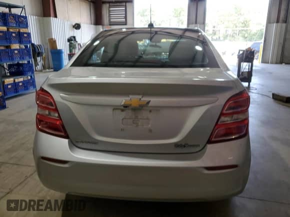 2017 Chevrolet Sonic LS с VIN 1G1JB5SH2H4123651, выставлен на аукционе Copart как лот 82694485 с пробегом Не указан миль и Списание • Salvage title. История ставок и продаж доступна на DreamBid. Изображение 6.