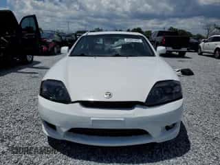 2006 Hyundai Tiburon GT с VIN KMHHN65F46U229380, выставлен на аукционе Copart как лот 65881445 с пробегом Не указан миль и Списание • Salvage title. История ставок и продаж доступна на DreamBid. Изображение 5.
