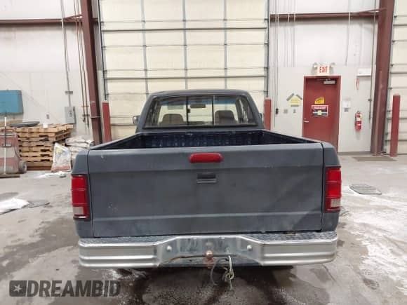 1994 Dodge Dakota z VIN 1B7GG23Y7RS709954, wystawiony jako IAAI lot #42571200 z przebiegiem 184 125 mil mil oraz . Historia ofert i sprzedaży dostępna na DreamBid. Obrazek 16.