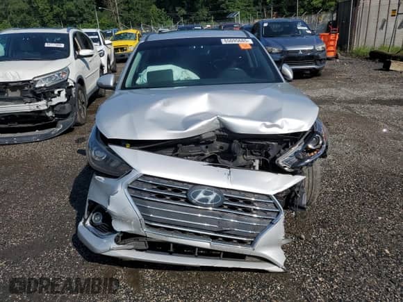 2020 Hyundai Accent Limited z VIN 3KPC34A60LE123971, wystawiony jako Copart lot #65095685 z przebiegiem Nie podano mil oraz Szkoda całkowita • Salvage title. Historia ofert i sprzedaży dostępna na DreamBid. Obrazek 5.