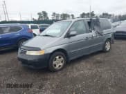 ✅ 2001 Honda Odyssey EX • VIN: 2HKRL18661H618490 • Lot: 43773737. Listed on IAAI with 141,985 mi. Free auction sales archive from the USA and detailed vehicle history report at DreamBid. Image 2.