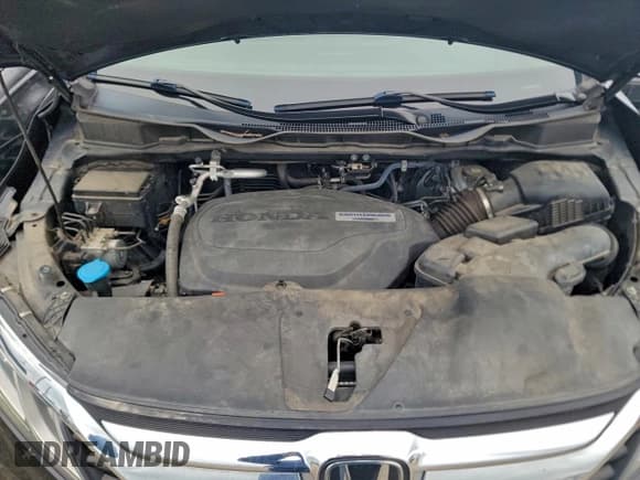 ✅ 2019 Honda Odyssey EX • VIN: 5FNRL6H57KB136941 • Лот: 96325235. Опубликован ранее на Copart с пробегом 83 315 миль. Бесплатный доступ к архиву аукционных продаж из США и подробный отчёт об истории автомобиля на DreamBid. Изображение 7.