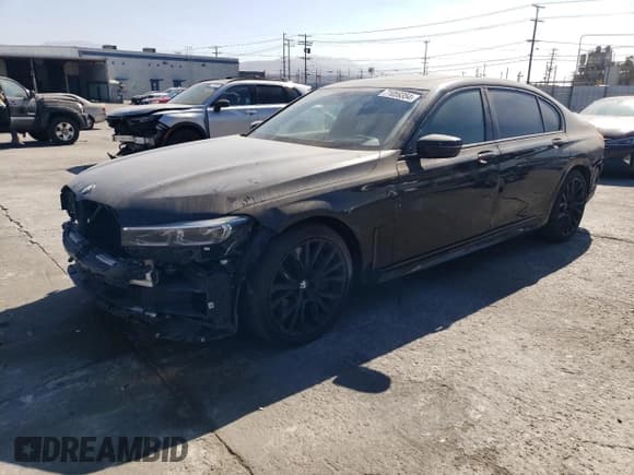 ✅ 2022 BMW 7 Series 750i xDrive • VIN: WBA7U2C08NCJ27706 • Lot: 71059354. Listed on Copart with 33,005 mi. Free auction sales archive from the USA and detailed vehicle history report at DreamBid. Image 1.