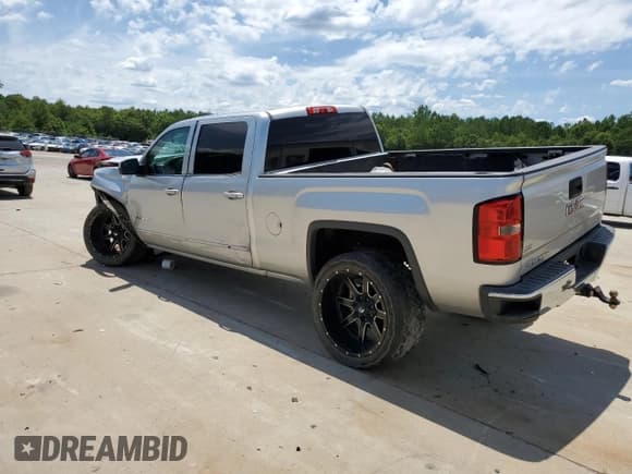✅ 2014 GMC Sierra 1500 SLE • VIN: 3GTU2UEC3EG118679 • Lot: 62871924. Listed on Copart with 135,414 mi. Free auction sales archive from the USA and detailed vehicle history report at DreamBid. Image 2.