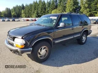 ✅ 1998 Chevrolet Blazer LS • VIN: 1GNDT13W0W2188389 • Lot: 80950185. Wystawiony na Copart z przebiegiem 153 997 mil. Bezpłatny archiwum sprzedaży aukcyjnych z USA i szczegółowy raport historii pojazdu na DreamBid. Zdjęcie 1.