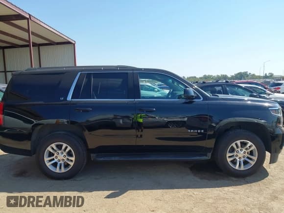 ✅ 2020 Chevrolet Tahoe LT • VIN: 1GNSKBKC5LR121183 • Lot: 43394920. Listed on IAAI with 140,841 mi. Free auction sales archive from the USA and detailed vehicle history report at DreamBid. Image 13.