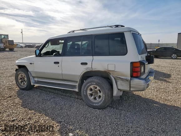 ✅ 1998 Mitsubishi Montero • VIN: JA4MR51R6WJ002639 • Lot: 82756475. Wystawiony na Copart z przebiegiem 234 948 mil. Bezpłatny archiwum sprzedaży aukcyjnych z USA i szczegółowy raport historii pojazdu na DreamBid. Zdjęcie 2.