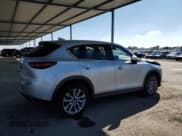 ✅ 2021 Mazda CX-5 Grand Touring • VIN: JM3KFBDM7M1342424 • Lot: 86302115. Wystawiony na Copart z przebiegiem 70 840 mil. Bezpłatny archiwum sprzedaży aukcyjnych z USA i szczegółowy raport historii pojazdu na DreamBid. Zdjęcie 3.