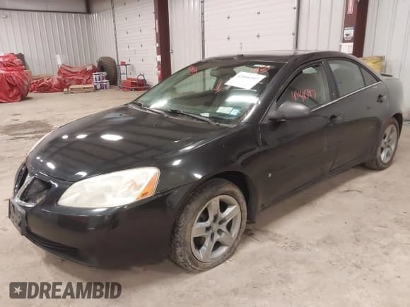 ✅ 2009 Pontiac G6 1SA • VIN: 1G2ZG57B994171248 • Lot: 42335463. Listed on IAAI with 169,611 mi. Free auction sales archive from the USA and detailed vehicle history report at DreamBid. Image 2.