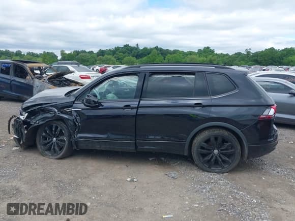 ✅ 2021 Volkswagen Tiguan SE • VIN: 3VV2B7AX4MM111887 • Lot: 42290153. Wystawiony na IAAI z przebiegiem 75 773 mil. Bezpłatny archiwum sprzedaży aukcyjnych z USA i szczegółowy raport historii pojazdu na DreamBid. Zdjęcie 14.