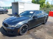 ✅ 2023 BMW M5 • VIN: WBS83CH01PCN06101 • Lot: 43116209. Listed on IAAI with 13,275 mi. Free auction sales archive from the USA and detailed vehicle history report at DreamBid. Image 2.