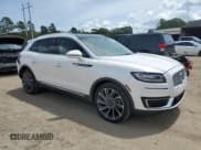 ✅ 2019 Lincoln Nautilus Reserve • VIN: 2LMPJ6LPXKBL10858 • Lot: 59851325. Listed on Copart with 46,809 mi. Free auction sales archive from the USA and detailed vehicle history report at DreamBid. Image 4.