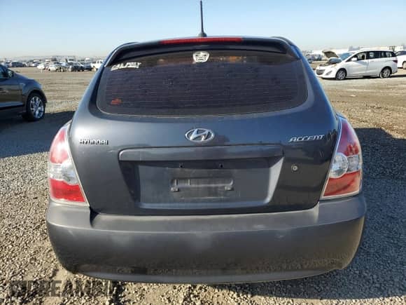 2009 Hyundai Accent GS z VIN KMHCM36C09U130141, wystawiony jako Copart lot #78757034 z przebiegiem 145 482 mil mil oraz Szkoda całkowita • Salvage title. Historia ofert i sprzedaży dostępna na DreamBid. Obrazek 6.