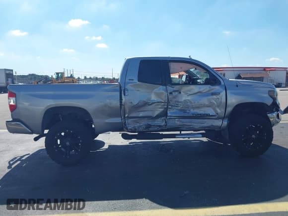 ✅ 2014 Toyota Tundra SR5 • VIN: 5TFRM5F18EX073513 • Lot: 43738760. Listed on IAAI with 92,586 mi. Free auction sales archive from the USA and detailed vehicle history report at DreamBid. Image 13.