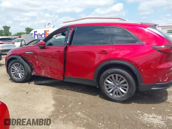 ✅ 2025 Mazda CX-90 Preferred • VIN: JM3KKBHD3S1211509 • Lot: 42112252. Listed on IAAI with 2,112 mi. Free auction sales archive from the USA and detailed vehicle history report at DreamBid. Image 14.