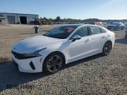 ✅ 2021 Kia K5 EX • VIN: 5XXG34J25MG033688 • Лот: 82343775. Опубликован ранее на Copart с пробегом 70 403 миль. Бесплатный доступ к архиву аукционных продаж из США и подробный отчёт об истории автомобиля на DreamBid. Изображение 1.