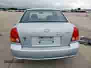 2003 Hyundai Accent GL z VIN KMHCG45C73U481294, wystawiony jako Copart lot #55958005 z przebiegiem 136 964 mil mil oraz Czysty tytuł • Clean title. Historia ofert i sprzedaży dostępna na DreamBid. Obrazek 6.