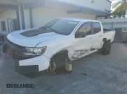 ✅ 2021 Chevrolet Colorado 4WD ZR2 • VIN: 1GCGTEEN4M1118852 • Lot: 90738525. Listed on Copart with 57,185 mi. Free auction sales archive from the USA and detailed vehicle history report at DreamBid. Image 1.