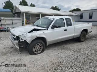 2003 Dodge Dakota SLT with VIN 1D7HL42X93S256342, listed as a Copart auction lot 80322324 with 105,049 mi miles and Salvage title. Bid and sale history available at DreamBid. Image 1.