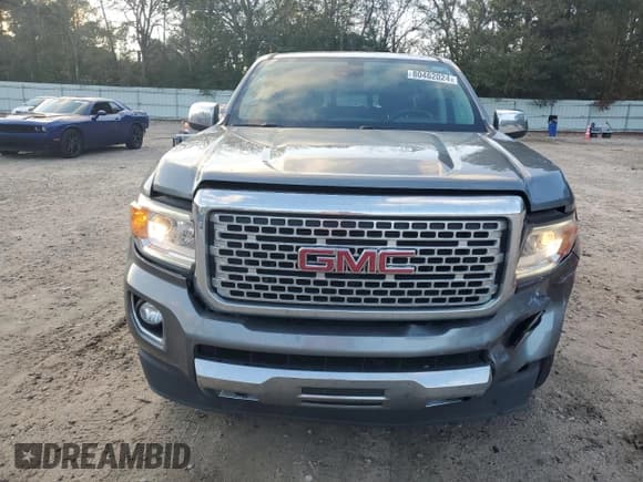 ✅ 2020 GMC Canyon 4WD Denali • VIN: 1GTG6EEN4L1245073 • Лот: 80462024. Опубликован ранее на Copart с пробегом 99 269 миль. Бесплатный доступ к архиву аукционных продаж из США и подробный отчёт об истории автомобиля на DreamBid. Изображение 5.