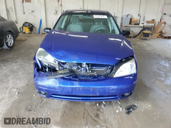 ✅ 2006 Ford Focus S • VIN: 1FAHP34N46W245482 • Lot: 85675445. Wystawiony na Copart z przebiegiem 205 509 mil. Bezpłatny archiwum sprzedaży aukcyjnych z USA i szczegółowy raport historii pojazdu na DreamBid. Zdjęcie 5.