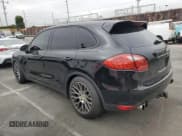 ✅ 2011 Porsche Cayenne S Hybrid • VIN: WP1AE2A29BLA94235 • Лот: 68866195. Опубликован ранее на Copart с пробегом 134 092 миль. Бесплатный доступ к архиву аукционных продаж из США и подробный отчёт об истории автомобиля на DreamBid. Изображение 2.
