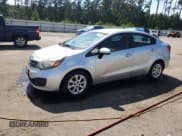 ✅ 2013 Kia Rio LX • VIN: KNADM4A38D6175778 • Лот: 71972795. Опубликован ранее на Copart с пробегом 157 924 миль. Бесплатный доступ к архиву аукционных продаж из США и подробный отчёт об истории автомобиля на DreamBid. Изображение 1.