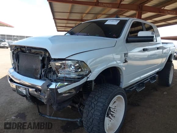 ✅ 2016 Ram 2500 Laramie • VIN: 3C6UR5NL3GG166601 • Lot: 42986350. Listed on IAAI with 91,150 mi. Free auction sales archive from the USA and detailed vehicle history report at DreamBid. Image 17.