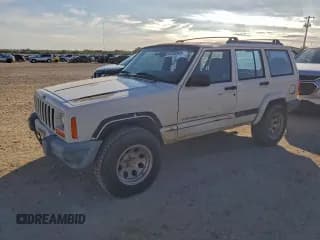 ✅ 2001 Jeep Cherokee Sport • VIN: 1J4FT48S21L614170 • Lot: 94708945. Listed on Copart with 173,209 mi. Free auction sales archive from the USA and detailed vehicle history report at DreamBid. Image 1.