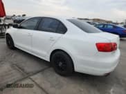 ✅ 2014 Volkswagen Jetta S • VIN: 3VW2K7AJ1EM334848 • Lot: 90334225. Listed on Copart with 86,766 mi. Free auction sales archive from the USA and detailed vehicle history report at DreamBid. Image 2.